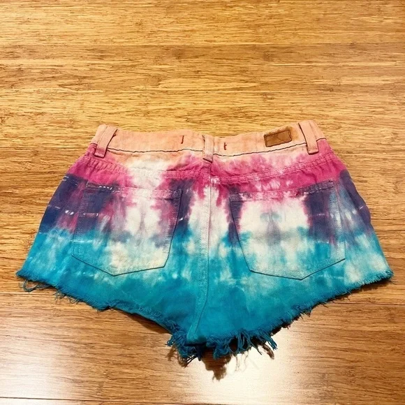 Urban Outfitters BDG tie-dye high rise cheeky distressed jean shorts. Size 27 - Picture 4 of 10